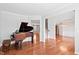 Spacious living room with hardwood floors and natural light at 701 Prince Dr, Holly Springs, NC 27540