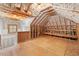 Spacious attic is unfinished and ready to be converted into storage or living space at 705 Glen Eden Dr, Raleigh, NC 27612