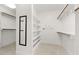 Spacious walk-in closet with custom shelving and ample storage space at 705 Glen Eden Dr, Raleigh, NC 27612