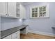 Home office boasts a built-in desk and cabinets, providing an efficient workspace at 705 Glen Eden Dr, Raleigh, NC 27612