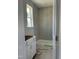 New bathroom with tiled shower, window for natural light, and classic white vanity at 72 Cultivator Ct, Angier, NC 27501