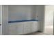 Bright bathroom featuring a white cabinet with drawers and countertop space at 72 Cultivator Ct, Angier, NC 27501