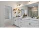 Bathroom with a double vanity, modern fixtures, and stylish decor, offering a spa-like experience at 72 Cultivator Ct, Angier, NC 27501