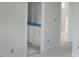 Bathroom featuring white cabinets with silver hardware at 72 Cultivator Ct, Angier, NC 27501