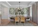 Dining room with designer wallpaper, wood table, seating for six, and natural light at 72 Cultivator Ct, Angier, NC 27501