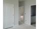 Hallway featuring a double-door closet at 72 Cultivator Ct, Angier, NC 27501