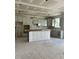 Large kitchen in progress, showcasing ample cabinet space and a central island area at 72 Cultivator Ct, Angier, NC 27501