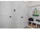 Mudroom features storage, a bench, and hooks for organization when entering the home at 72 Cultivator Ct, Angier, NC 27501