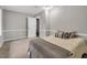 Well-lit bedroom with plush carpet and neutral walls at 7214 Southern Trl, Chapel Hill, NC 27516