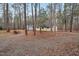 Back of the home in a wooded setting at 7214 Southern Trl, Chapel Hill, NC 27516