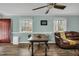Living room area features hardwood floors, comfortable seating, and natural light at 7214 Southern Trl, Chapel Hill, NC 27516