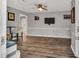 Spacious living room with stylish hardwood floors and modern decor at 7214 Southern Trl, Chapel Hill, NC 27516