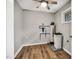 Well lit utility room with wood look floors and ceiling fan at 7214 Southern Trl, Chapel Hill, NC 27516