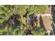 An overhead view of the property and the surrounding wooded area at 749 Fred Royster Rd, Henderson, NC 27537
