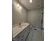 Updated bathroom featuring new vanity and countertops at 912 Hillsboro St, Oxford, NC 27565