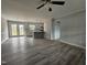 Open concept living room with wood floors and french doors at 912 Hillsboro St, Oxford, NC 27565