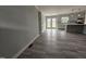 Open concept living room with wood floors and french doors at 912 Hillsboro St, Oxford, NC 27565