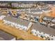Aerial view of new construction homes in a well-planned community with sidewalks at 94 Paperwhite Pl, Clayton, NC 27527