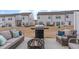 Inviting backyard patio space, perfect for outdoor dining and relaxation with grill and fire pit at 94 Paperwhite Pl, Clayton, NC 27527