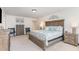 Spacious main bedroom featuring a decorative headboard, matching nightstands, and tasteful accents at 94 Paperwhite Pl, Clayton, NC 27527