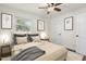 Cozy bedroom features contemporary design, lots of light, and stylish decor at 1006 Linwood Ave, Durham, NC 27701