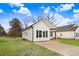Newly constructed one-story home with a concrete driveway and recently landscaped yard at 1021 E Edgerton St, Dunn, NC 28334