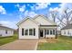 Charming one-story home with a new concrete driveway and manicured lawn at 1021 E Edgerton St, Dunn, NC 28334