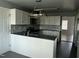 Modern kitchen featuring white cabinets, stainless steel appliances, and granite countertops at 104 Ginger Cir, Selma, NC 27576