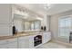 Bright bathroom with double vanity, granite countertops, and custom cabinetry at 105 Sunstone Dr, Cary, NC 27519