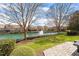 Enjoy this lush community view of the pond and fountain from your private backyard at 105 Sunstone Dr, Cary, NC 27519