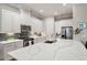 Bright kitchen with stainless steel appliances, modern cabinetry, and a spacious center island at 105 Sunstone Dr, Cary, NC 27519