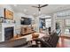 Inviting living room with fireplace, hardwood floors, and an open layout with abundant natural light at 105 Sunstone Dr, Cary, NC 27519