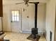 Kitchen featuring a stove and hardwood flooring at 1111 Spring Valley Lake Rd, Henderson, NC 27537