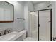 Bathroom with walk-in shower, granite vanity and sink at 1112 Jewel Creek Dr, Cary, NC 27519