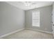 Bedroom featuring neutral walls, carpet, a ceiling fan and a window with blinds at 1112 Jewel Creek Dr, Cary, NC 27519