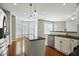 Bright eat-in kitchen with stainless steel appliances and a breakfast nook surrounded by windows at 1112 Jewel Creek Dr, Cary, NC 27519