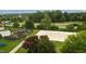 Overhead view of a volleyball court next to a playground and green trees at 1112 Jewel Creek Dr, Cary, NC 27519