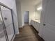 Elegant bathroom featuring a double vanity, a walk-in shower, and modern fixtures at 11844 Ayshire Dr, Middlesex, NC 27557