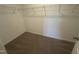 A walk-in closet with plenty of shelving, ideal for organized storage at 11844 Ayshire Dr, Middlesex, NC 27557