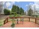 Inviting deck with a beautiful backyard view and cozy outdoor seating at 122 Banyon Tree Ln, Cary, NC 27513