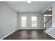 Bright living room with hardwood floors and lots of natural light at 122 Banyon Tree Ln, Cary, NC 27513