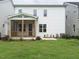 Backyard featuring a screened-in porch and well-maintained lawn at 1225 Barreto Drive Dr, Wendell, NC 27591