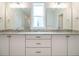 Bathroom with double vanity, granite countertops, and modern fixtures at 1225 Barreto Drive Dr, Wendell, NC 27591