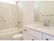 Well-lit bathroom with tub, shower, vanity, and toilet at 1225 Barreto Drive Dr, Wendell, NC 27591