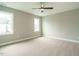 Spacious bedroom with neutral carpeting and lots of natural light at 1225 Barreto Drive Dr, Wendell, NC 27591