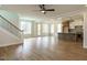 Open concept living area showcasing luxury vinyl plank flooring and a kitchen view at 1225 Barreto Drive Dr, Wendell, NC 27591