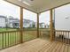 Screened-in porch with wooden floors and view of the backyard at 1225 Barreto Drive Dr, Wendell, NC 27591