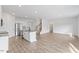 Spacious kitchen with stainless steel appliances, large island, and open floor plan at 140 Baker Farm Dr, Youngsville, NC 27596