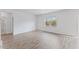 Well lit living room with hard surface floors and plenty of natural light coming from the window at 140 Baker Farm Dr, Youngsville, NC 27596