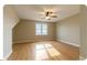 Bedroom with ceiling fan, natural light, neutral paint and hardwood floors, offering space and comfort at 148 Mohawk Dr, Louisburg, NC 27549